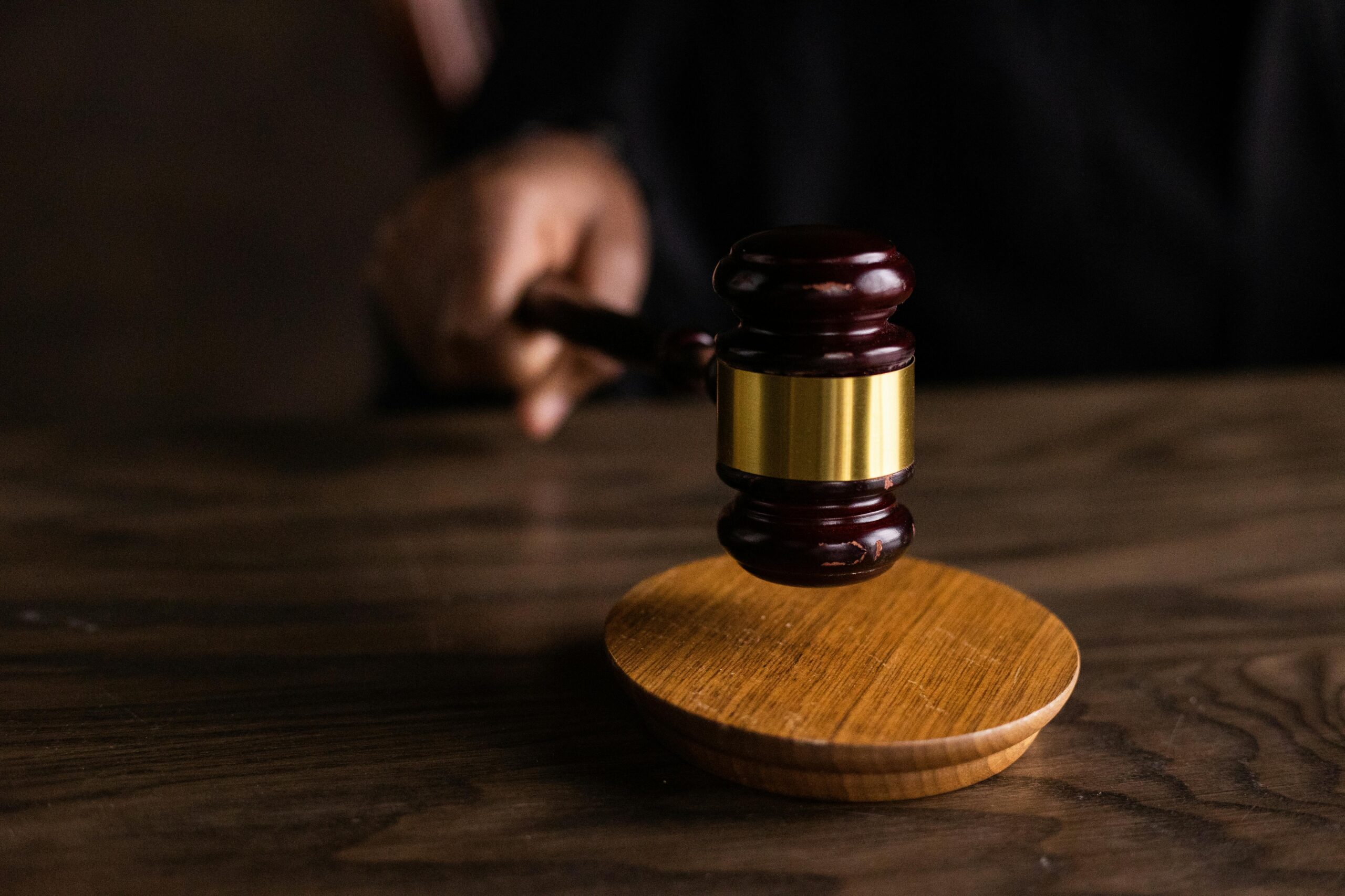 Judge banging a gavel on their desk