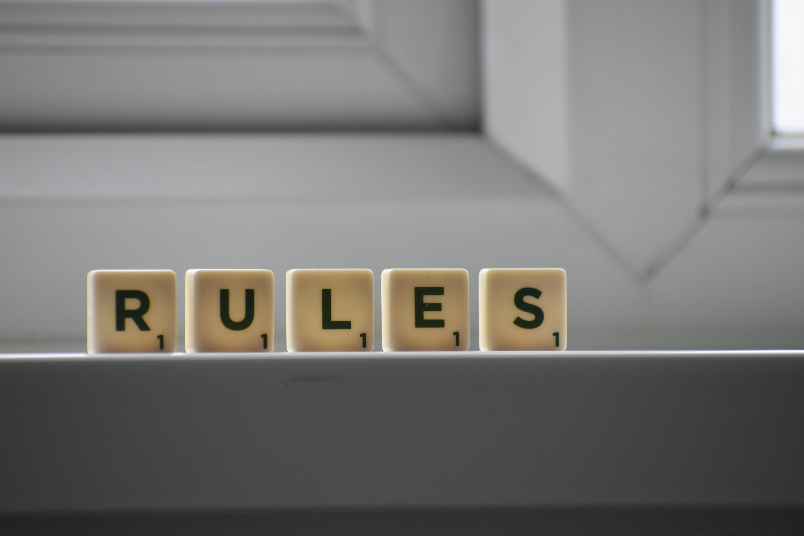 Blocks that spell out the word "RULES"
